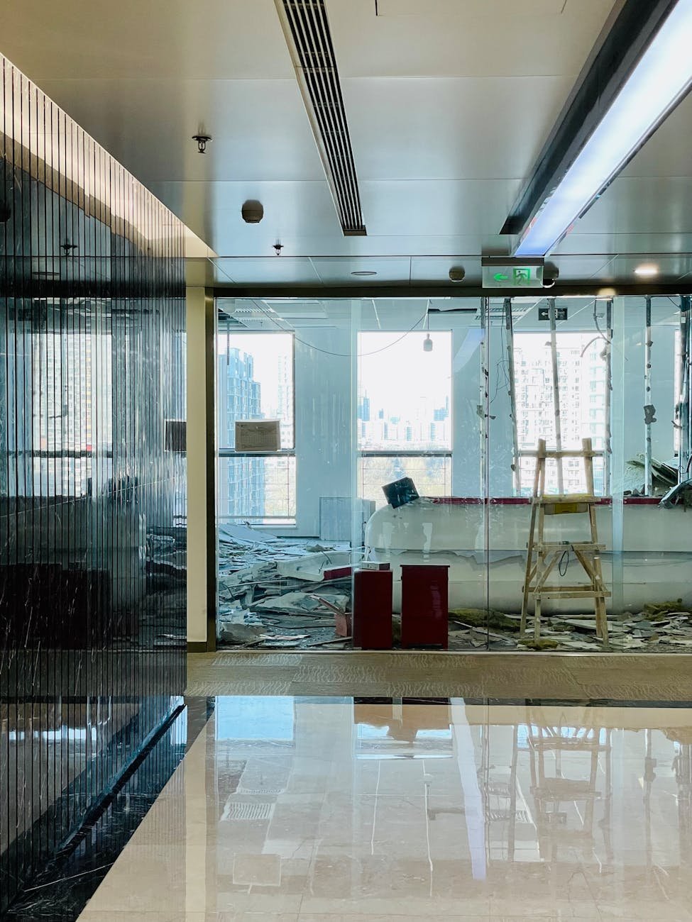 Modern building interior with a room full of construction and demolition debris